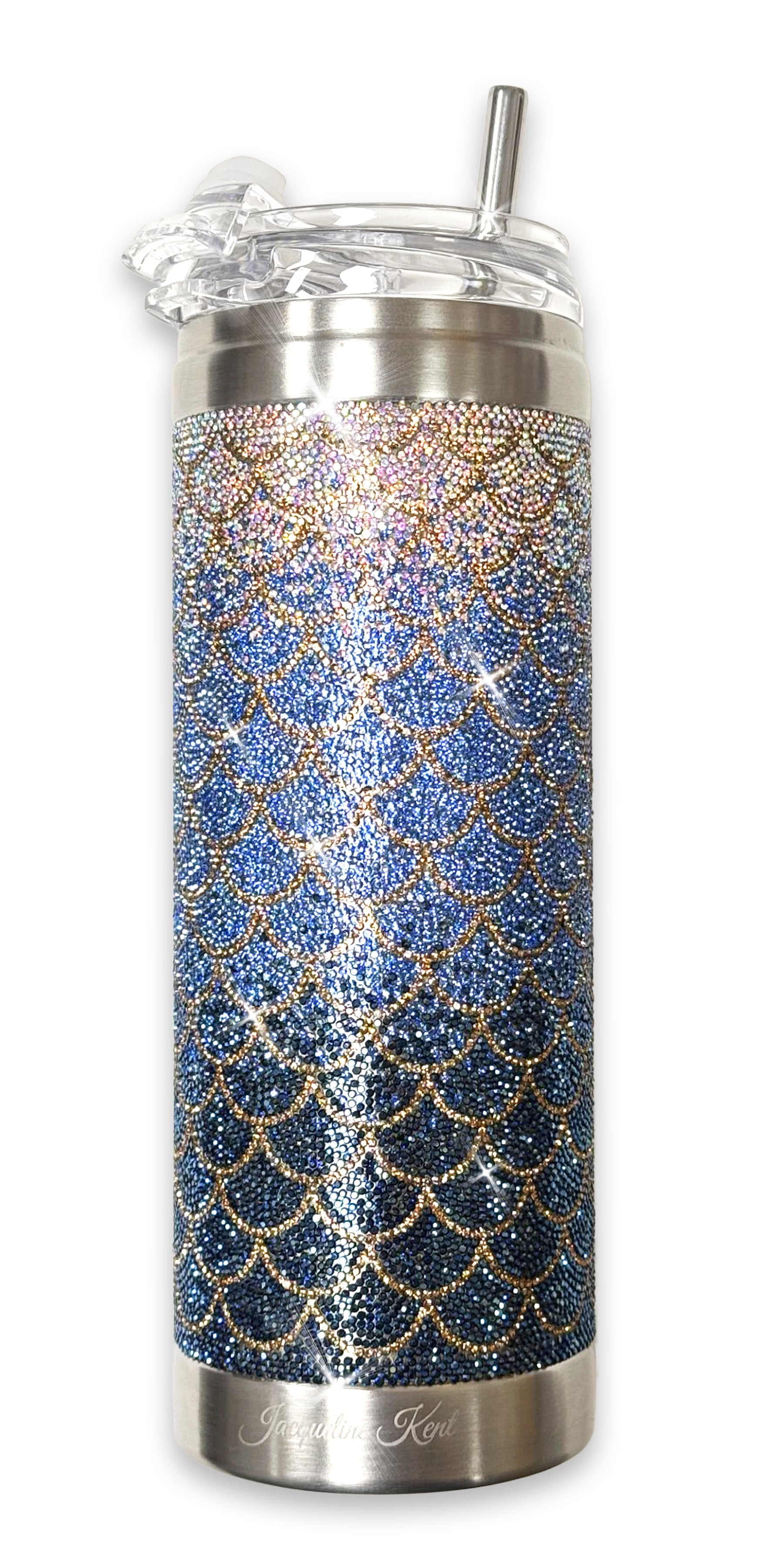 Crystal tumbler with blue and gold mermaid scale pattern on a white background