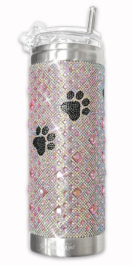 Silver tumbler in pink and AB crystals with rhinestone black paw prints on a white background