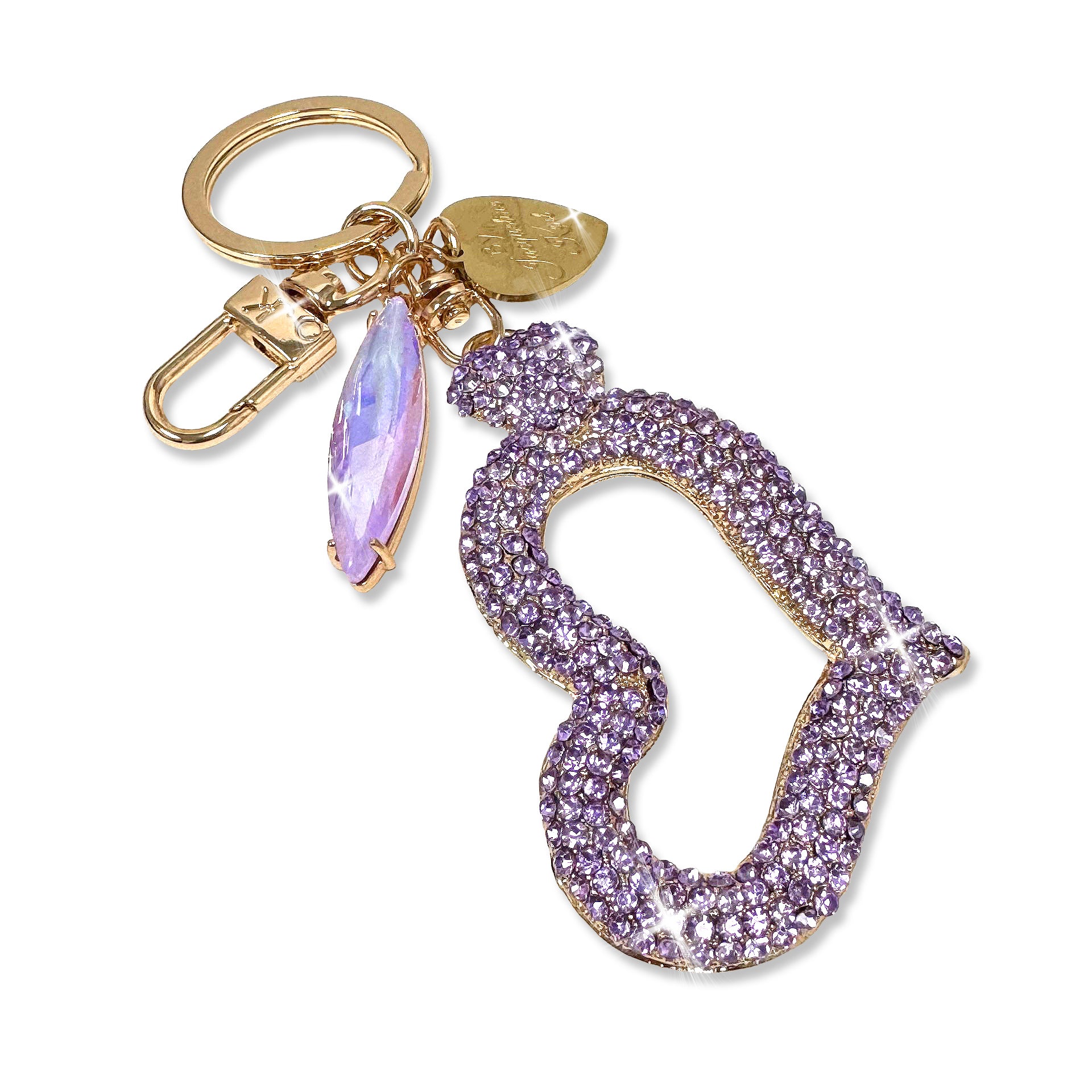 Large crystal heart-shaped charm in light purple rhinestones and gold accents on a white background