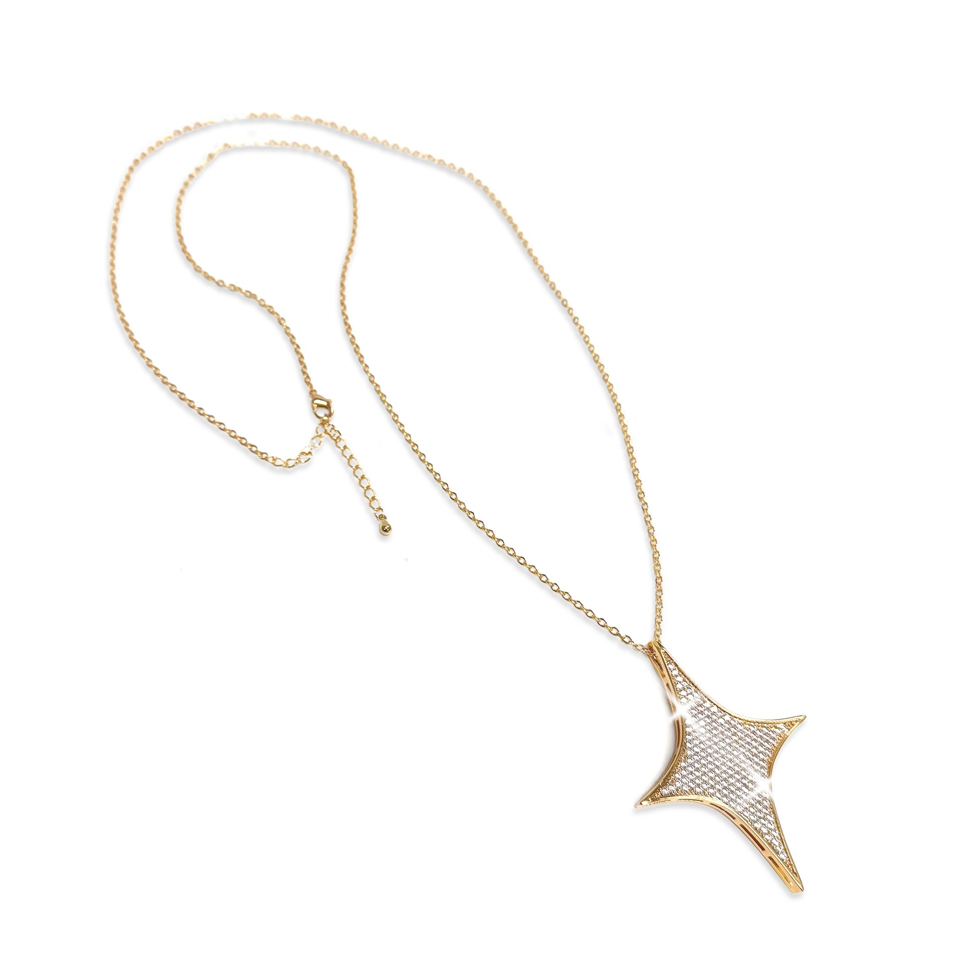 Gold necklace with a star-shaped pendant with clear rhinestones on a white background
