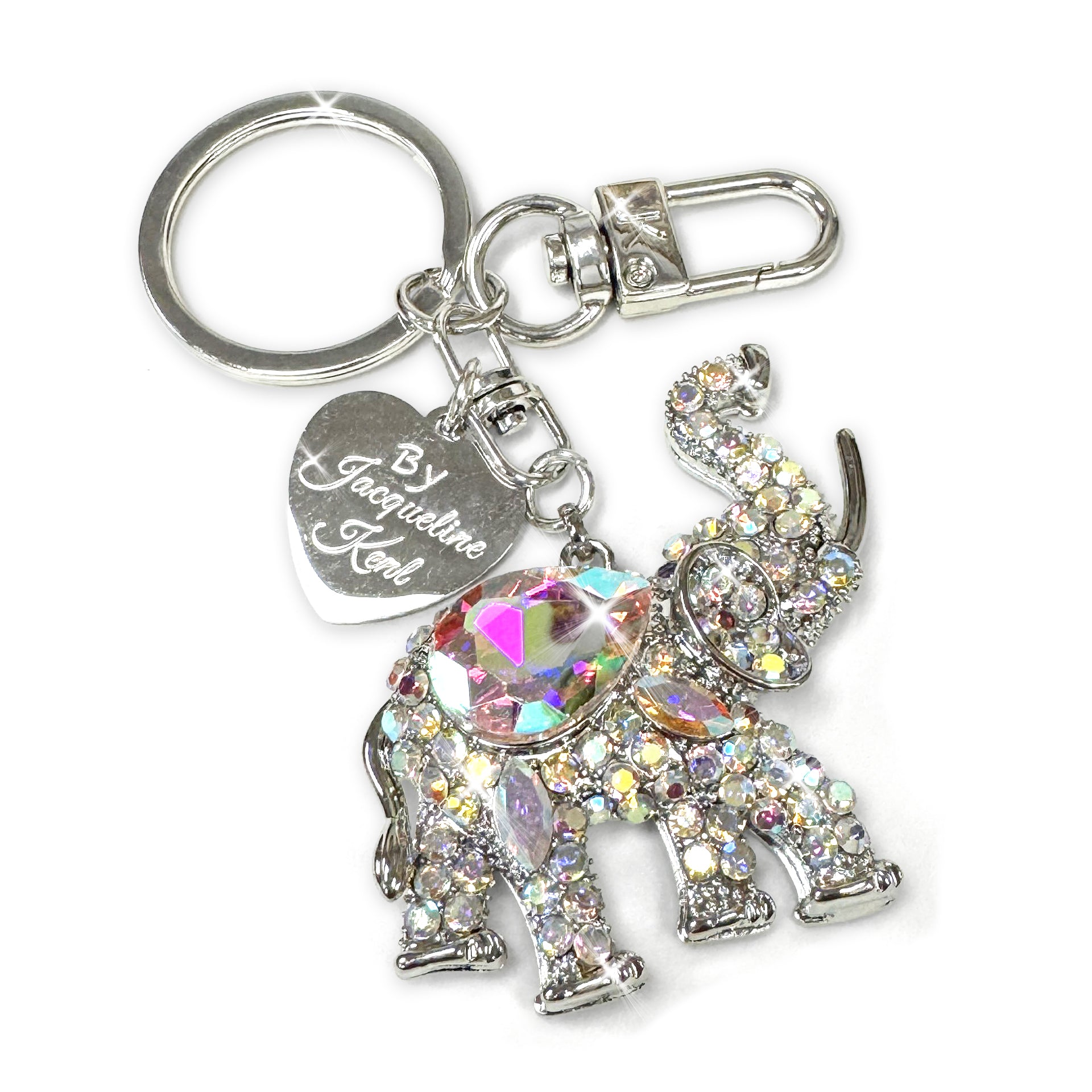 Keychain with elephant charm and heart-shaped Jacqueline Kent branded tag on a white background