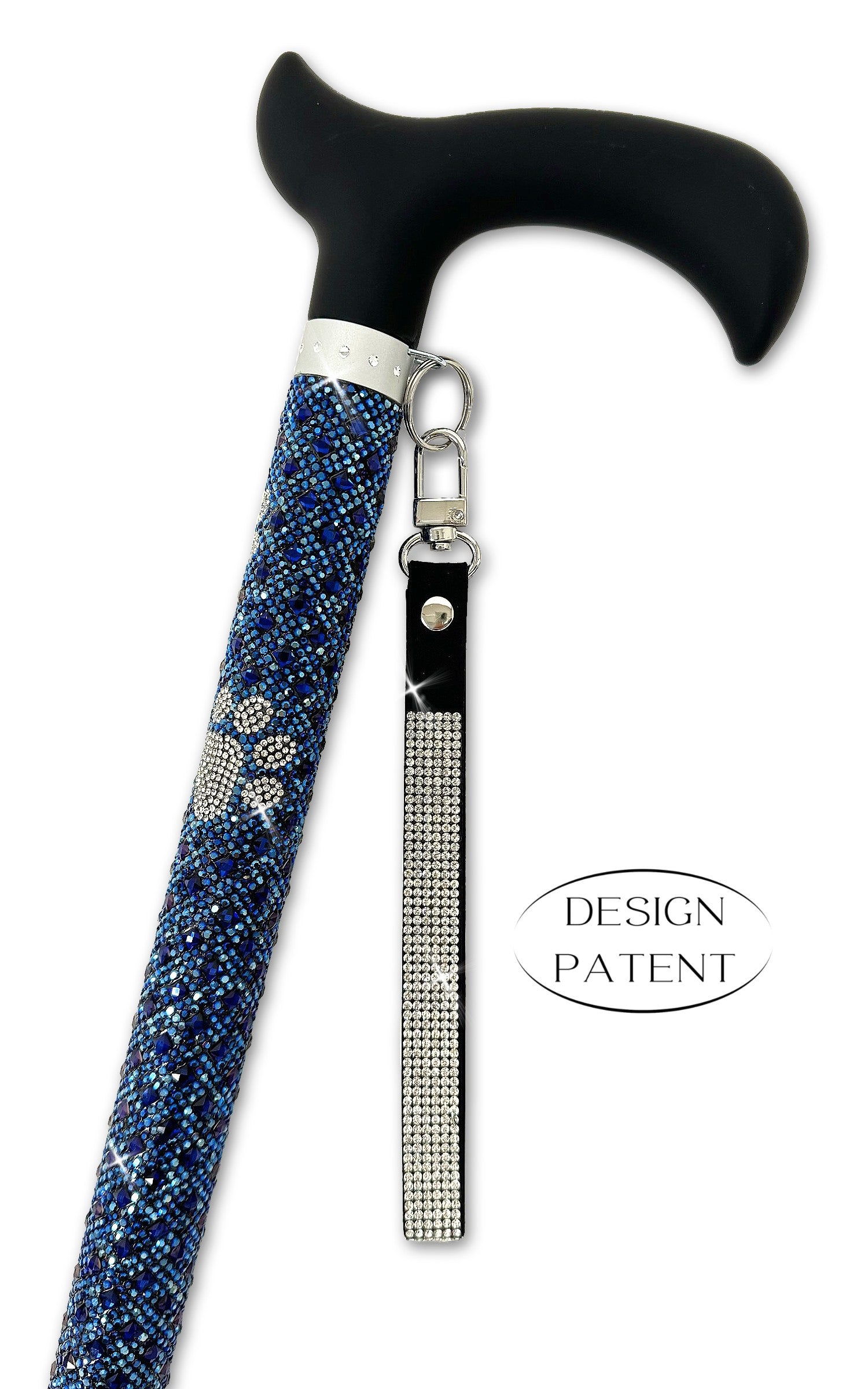 Decorative walking cane with navy blue and silver paw print coloured rhinestone shaft and black derby handle on a white background