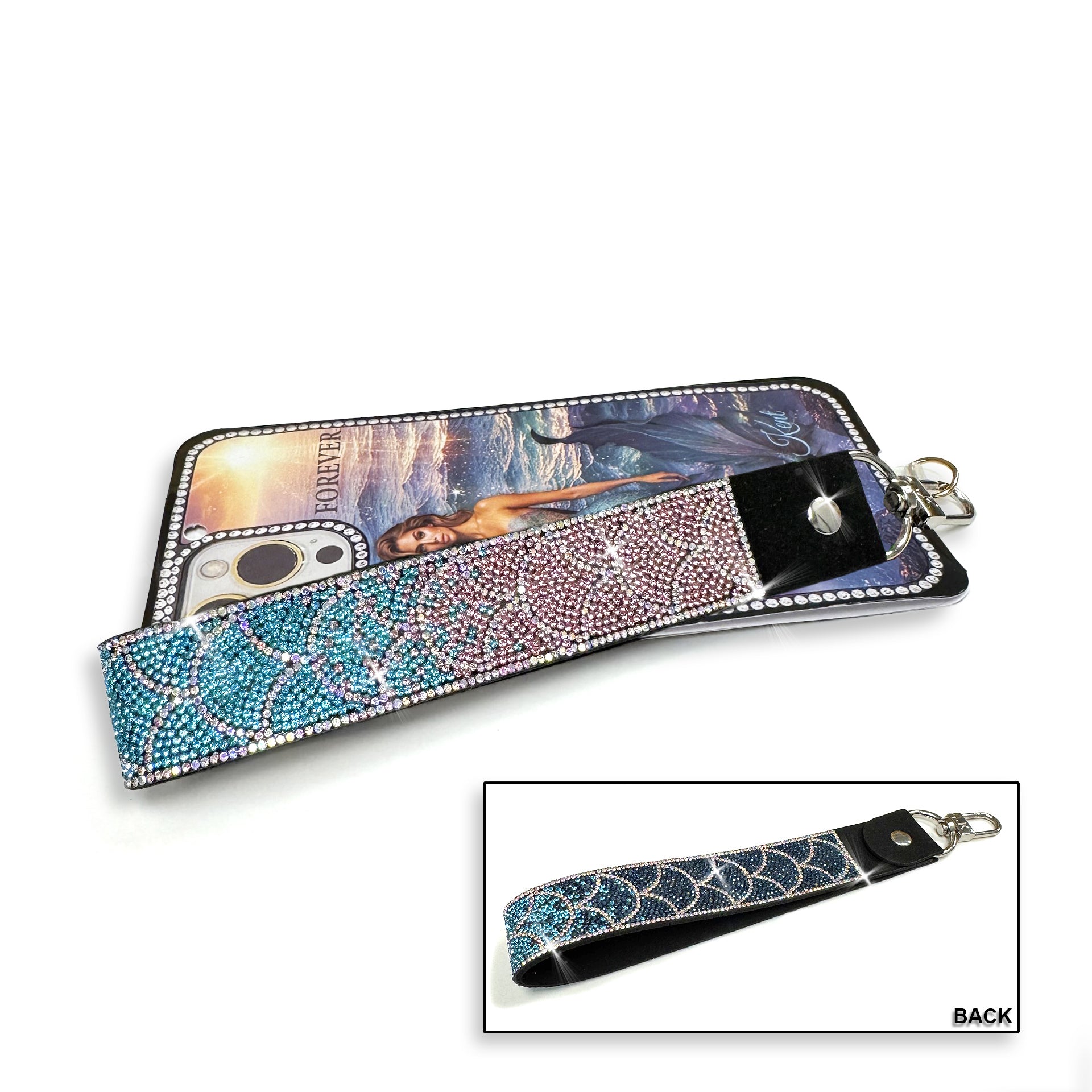 Phone/wrist lanyard with decorative mermaid scale pattern in pink, turquoise and navy ombre rhinestones with silver crystal details band and keychain on a white background.