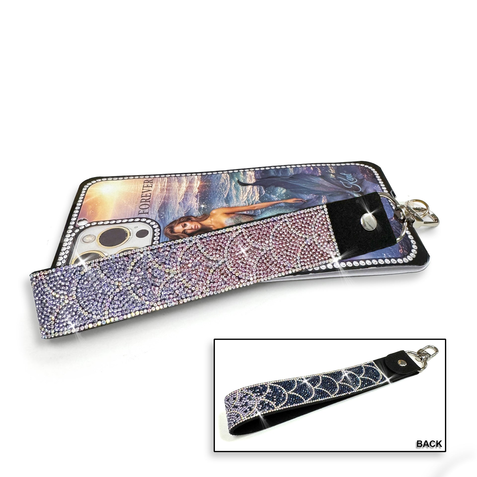 Phone/wrist lanyard in a mermaid scale pattern in navy, lavender and pink rhinestones with silver crystal details on a white background