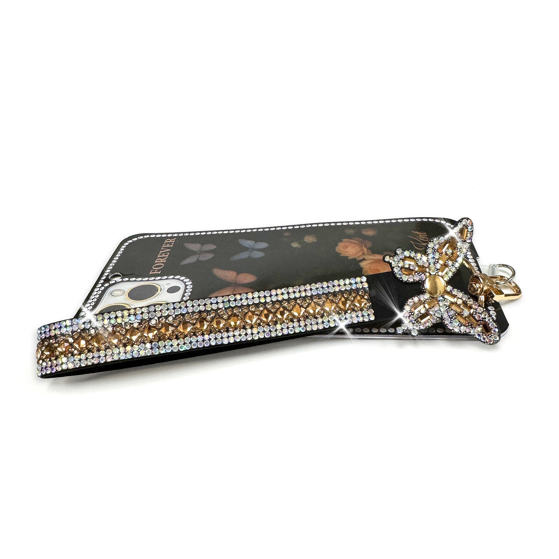 Decorative phone and wrist lanyard with butterfly charm and yellow and clear rhinestone details on a white background
