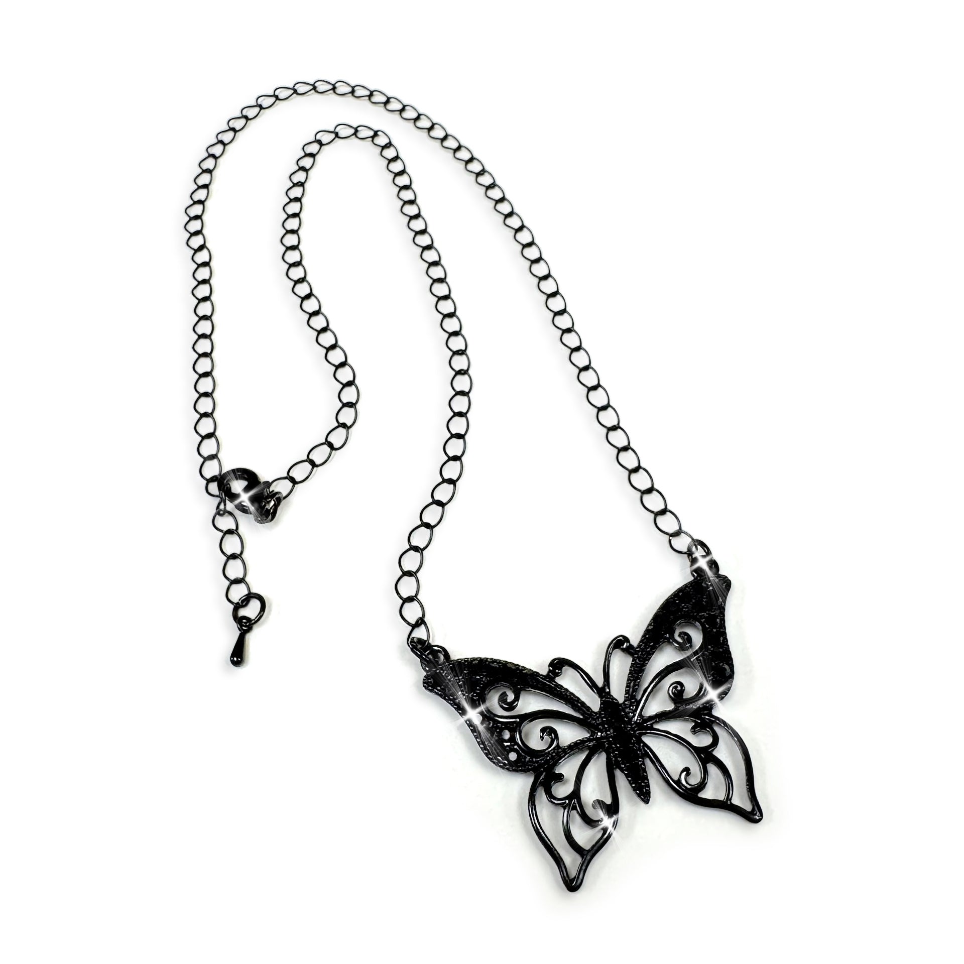 Black butterfly necklace on a white background