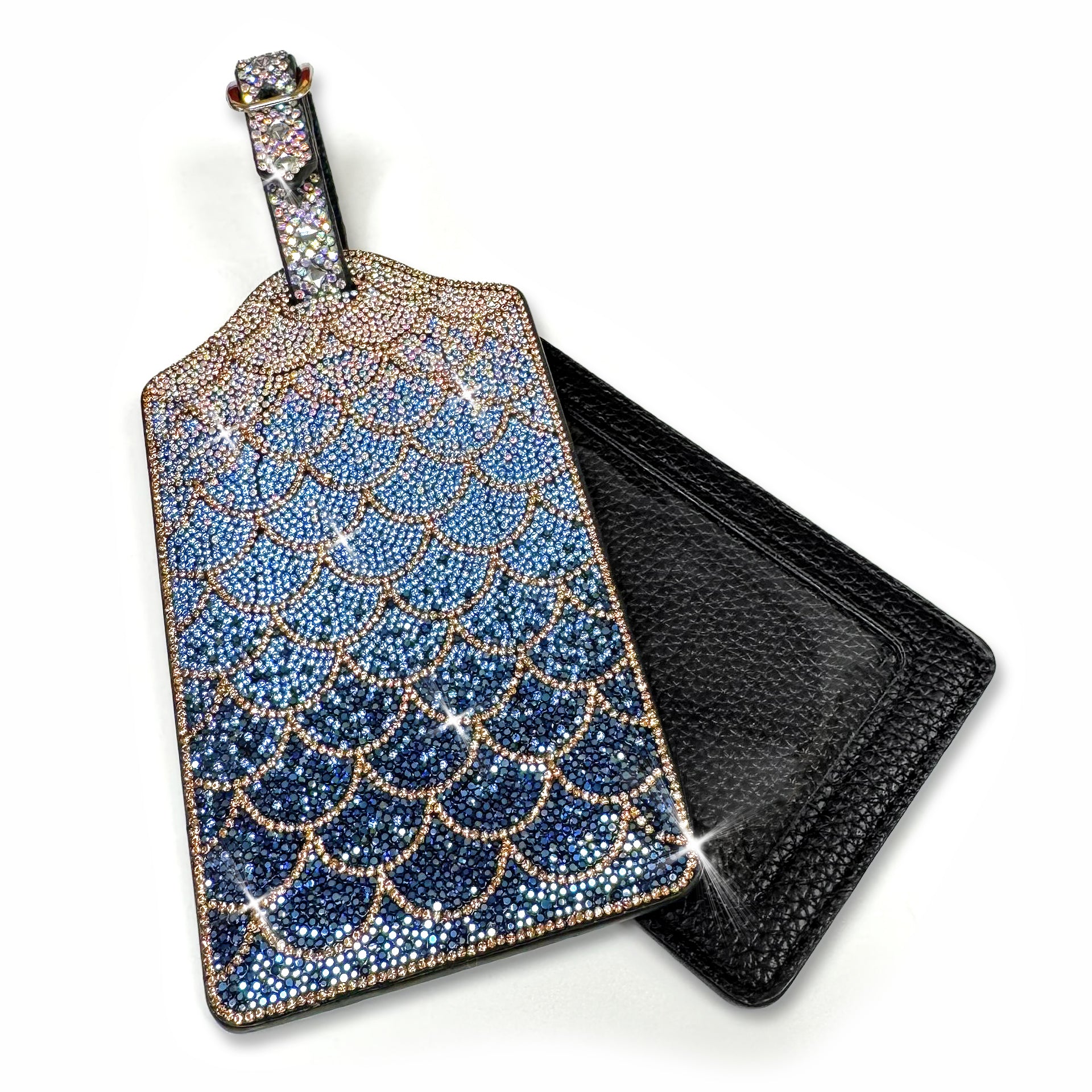 Decorative luggage tag with blue ombre and gold mermaid scale pattern on a white background