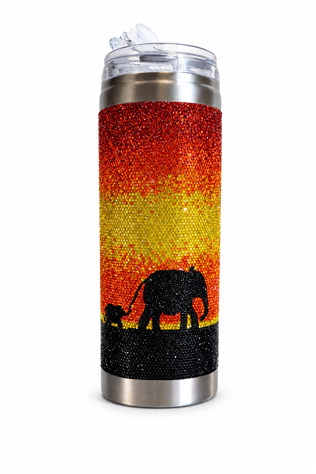 Tumbler with glittery rhinestone sunset design and elephant silhouette on a white background