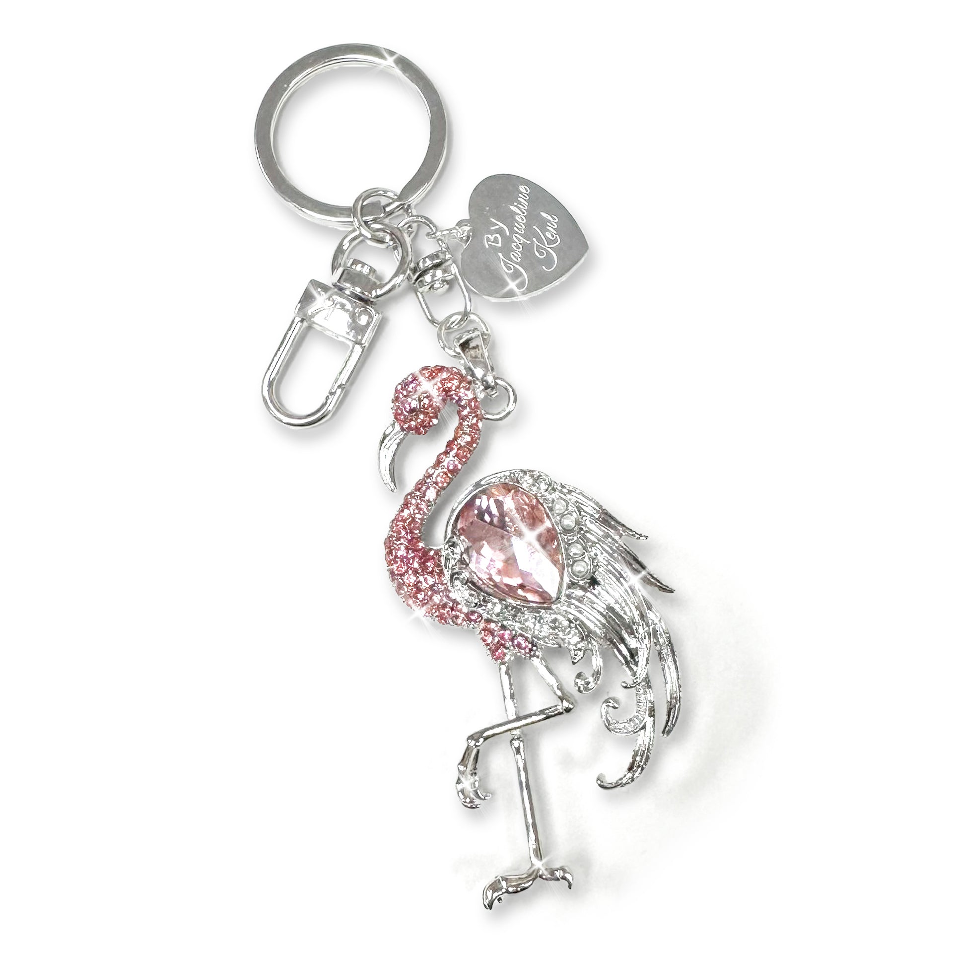 Flamingo keychain in silver with pink crystal, pink rhinestones and decorative pearls on a white background