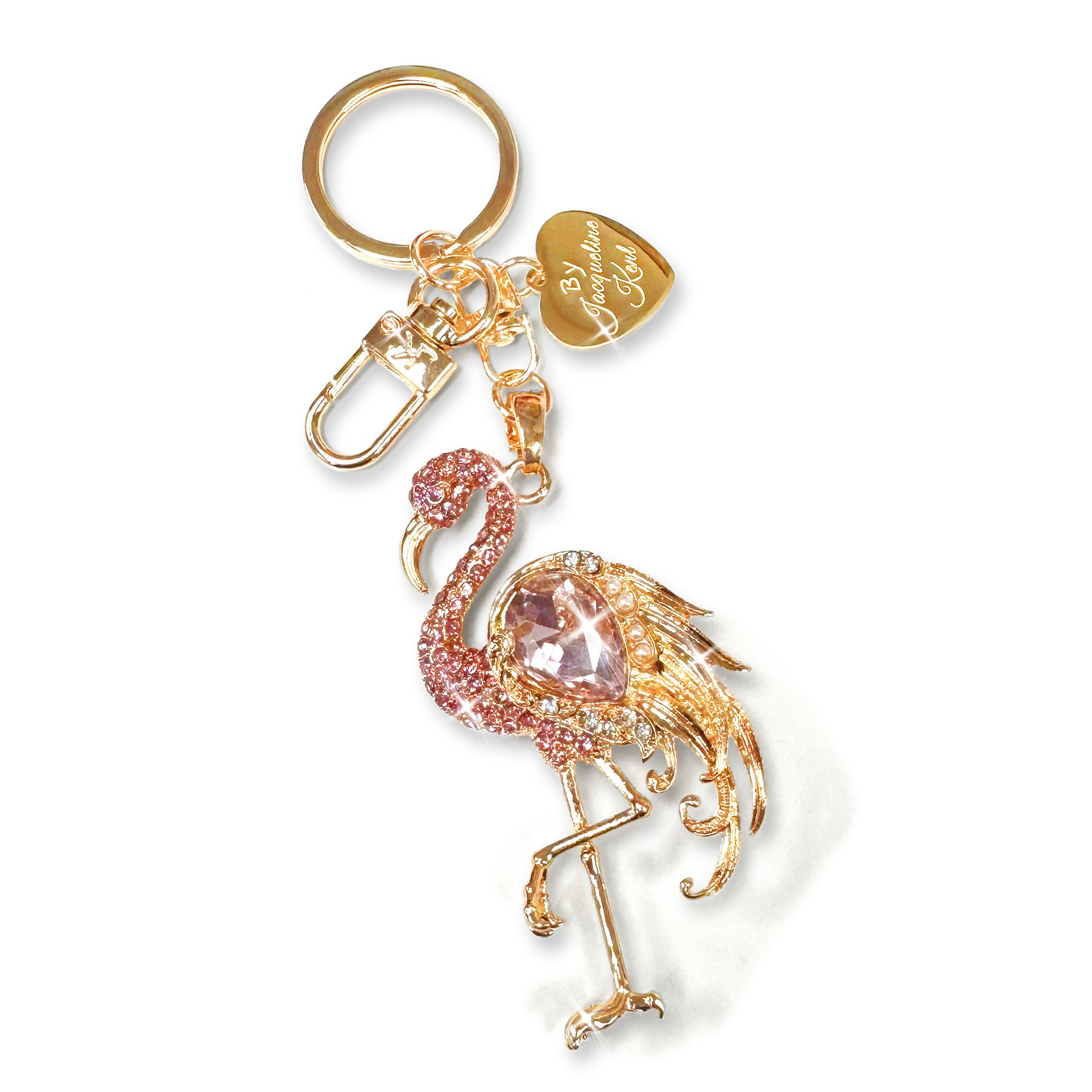 Flamingo keychain in gold with pink crystal, pink rhinestones and decorative pearls on a white background