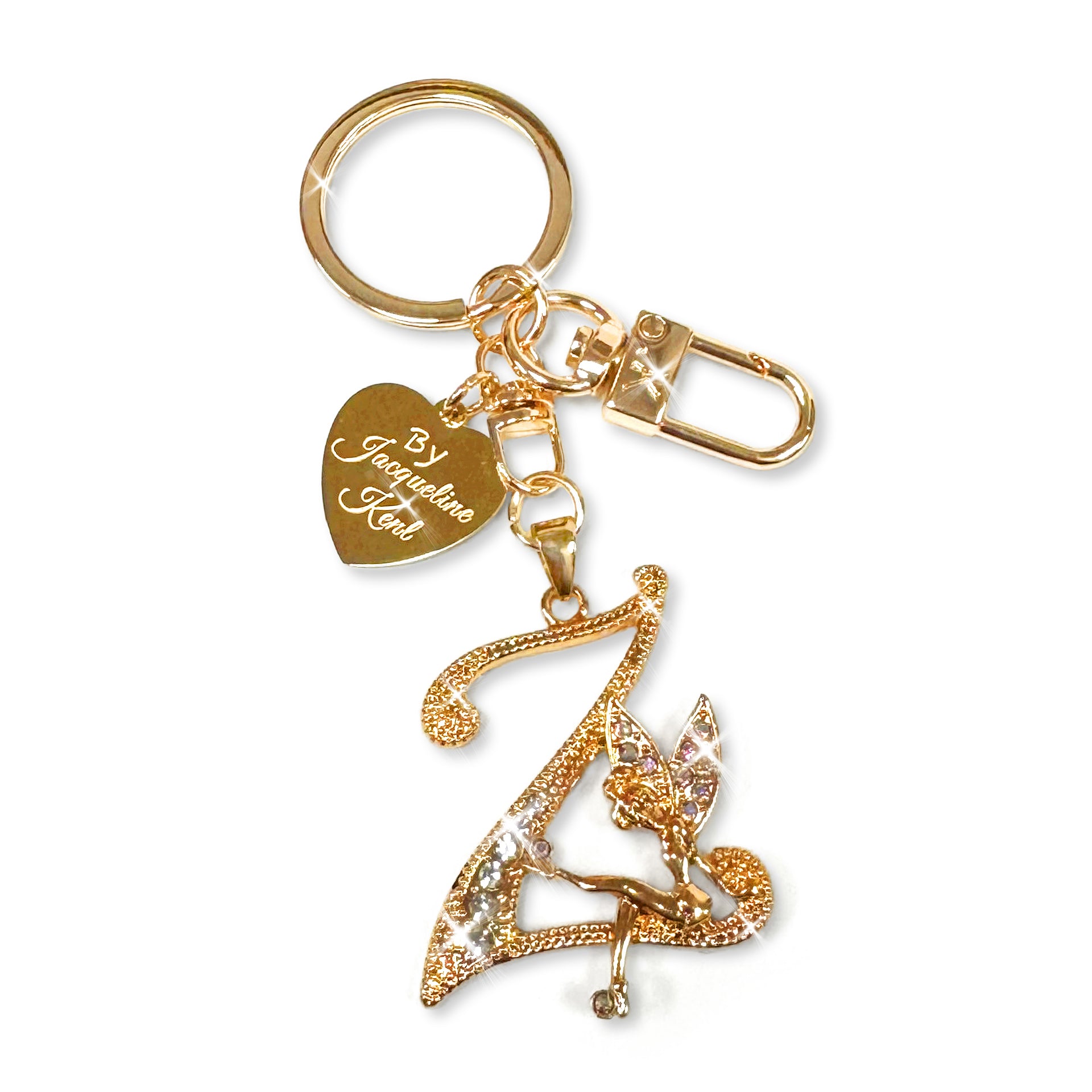 Gold and crystal embellished keychain with decorative letter 'Z' and heart-shaped Jacqueline Kent branded tag on a white background