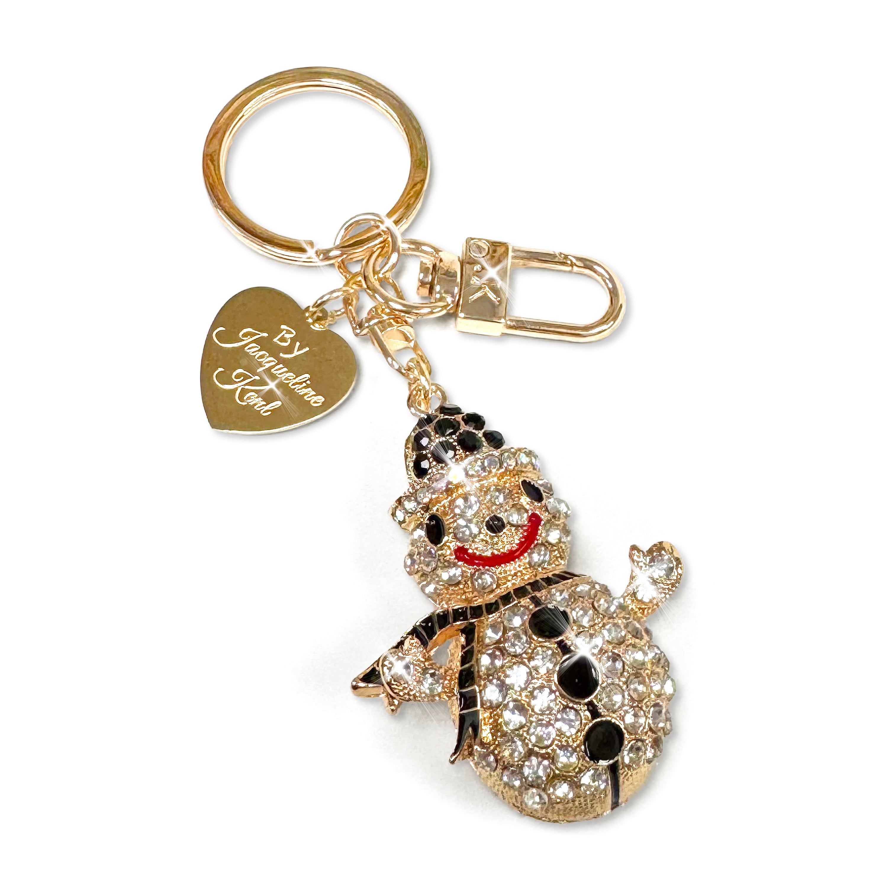 Snowman purse charm/keychain encrusted in clear, black and red rhinestone details with Jacqueline Kent heart shaped branded tag