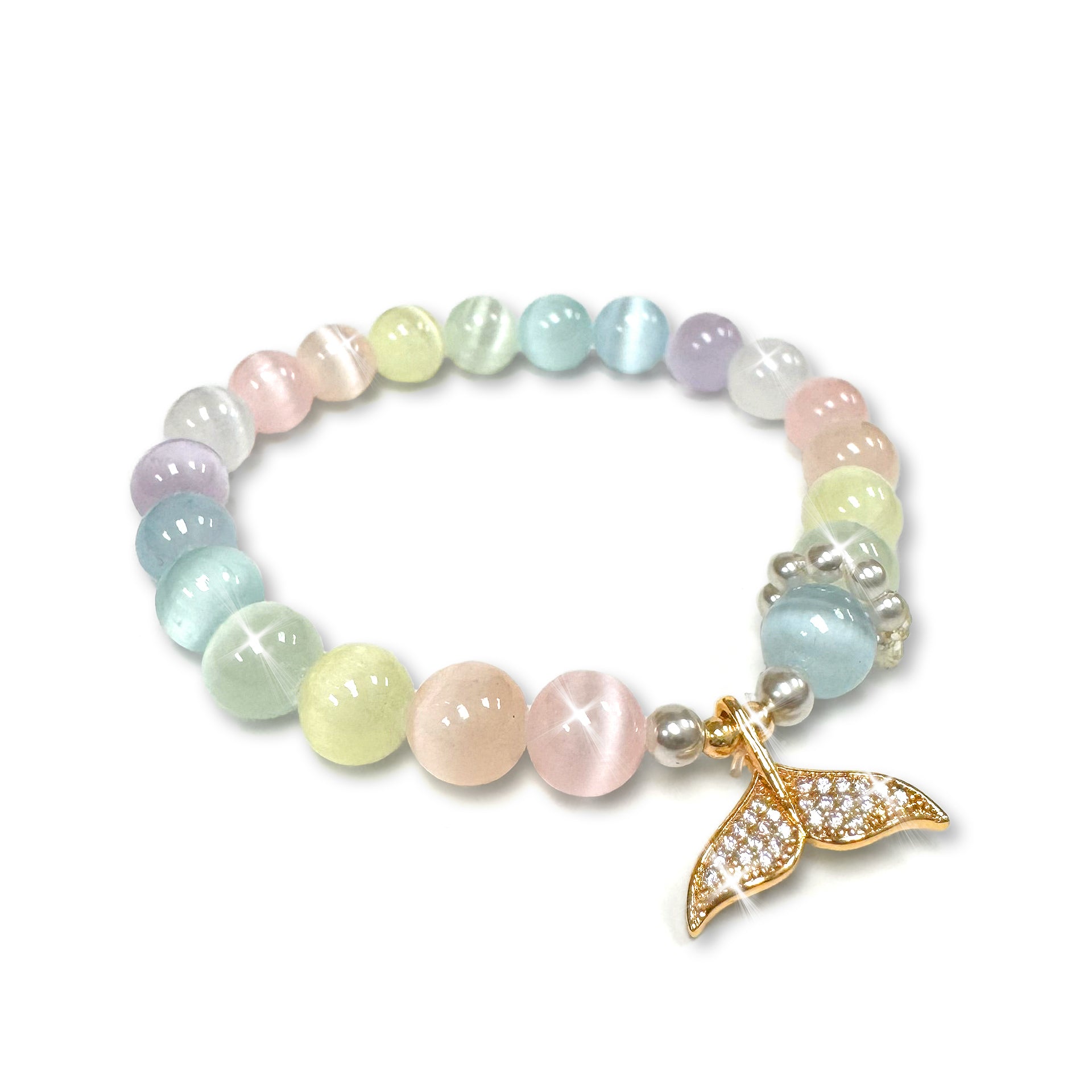 Pastel multi-coloured beaded bracelet with a gold mermaid tail charm with rhinestones on a white background