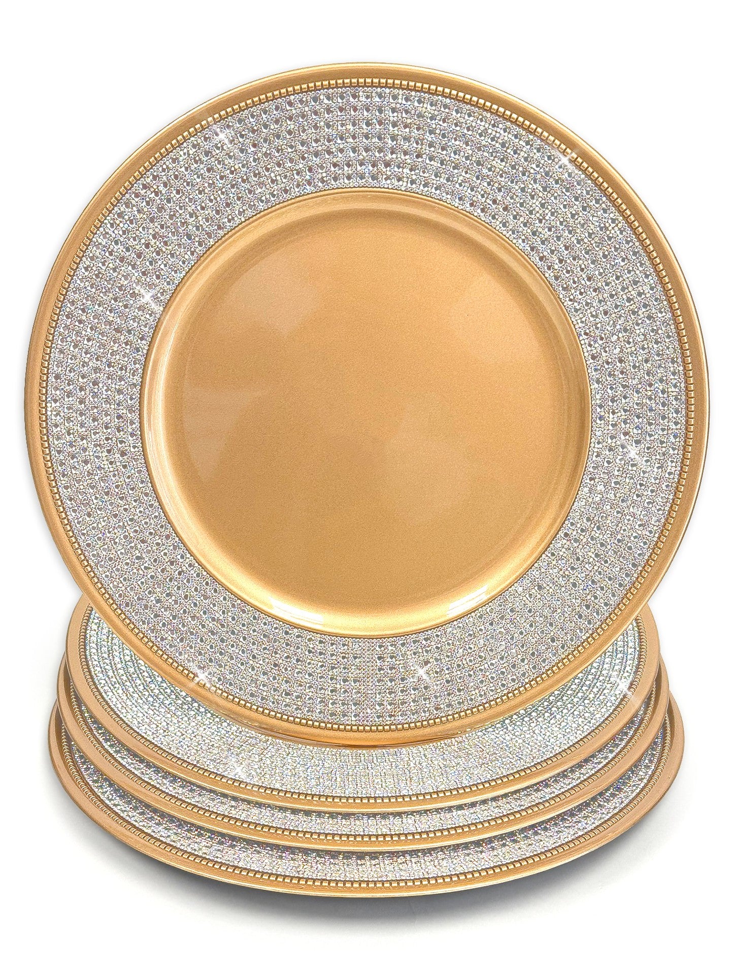 A stack of round decorative charger plates with a gold to silver ombre crystal rhinestones glitter pattern, set against a plain white background.