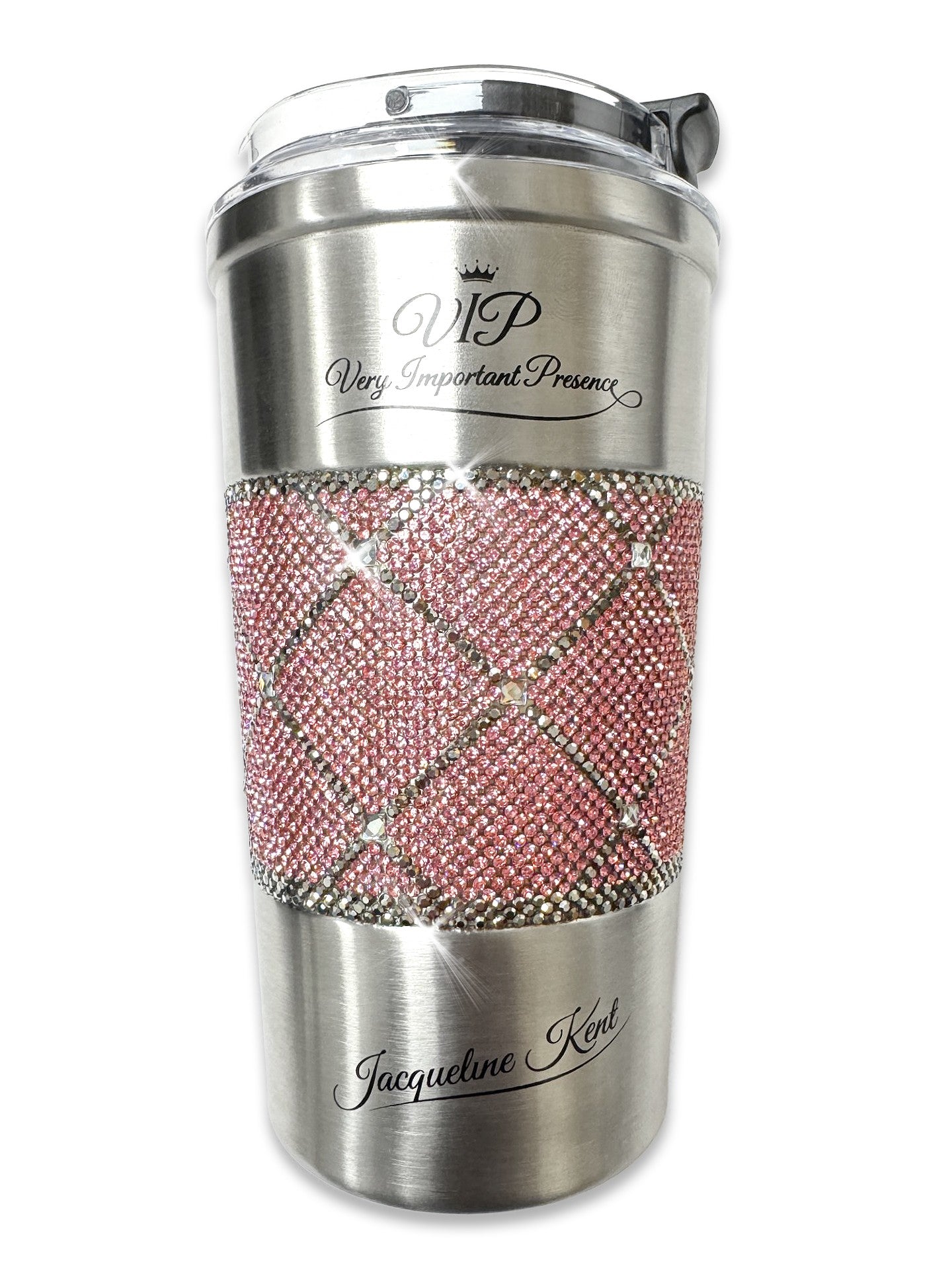 Jacueline Kent stainless steel coffee cup with pink, hematite and clear crystal rhinestone embellishments in a diamond cross pattern. Message on cup says "VIP, Very Important Presence. Jacquleine Kent signature at bottom of cup.
