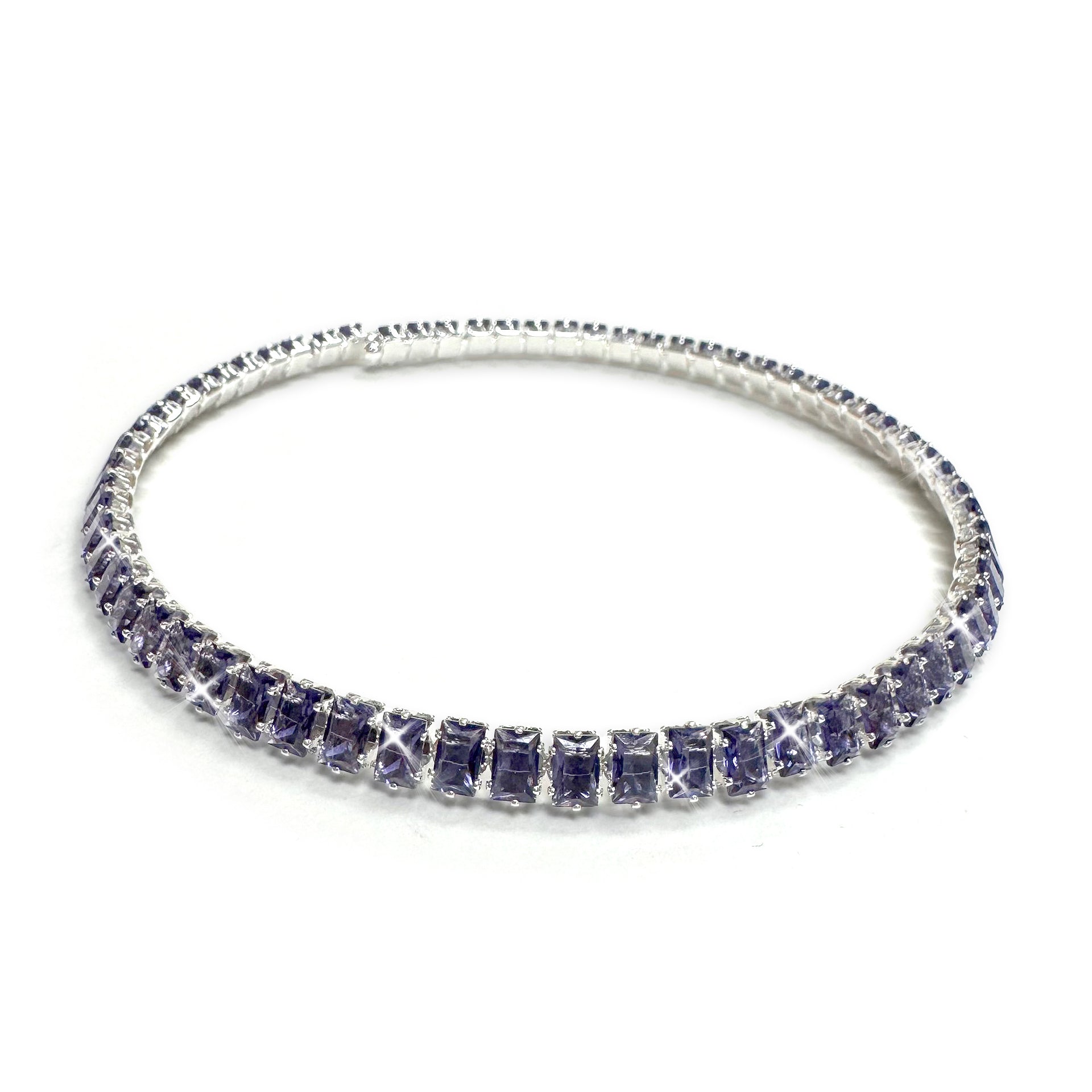 Silver necklace with purple crystals on a white background