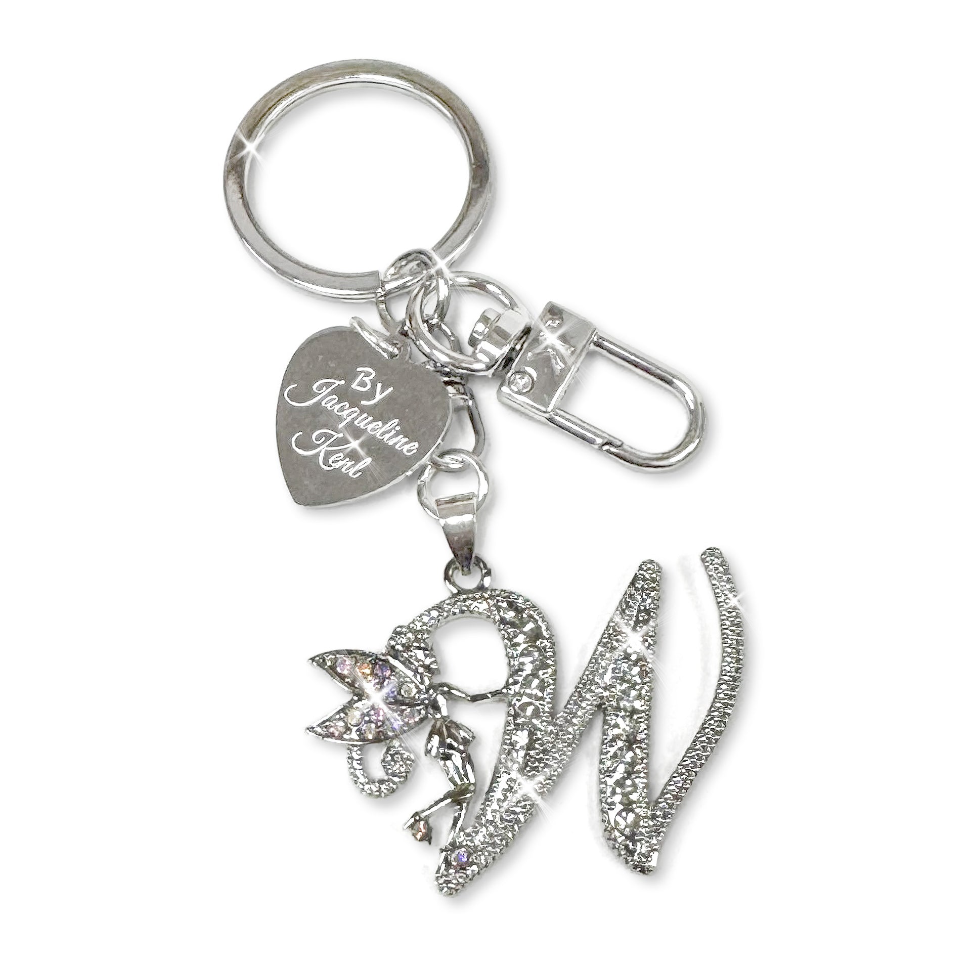 Silver and crystal embellished keychain with decorative letter 'W' and heart-shaped Jacqueline Kent branded tag on a white background