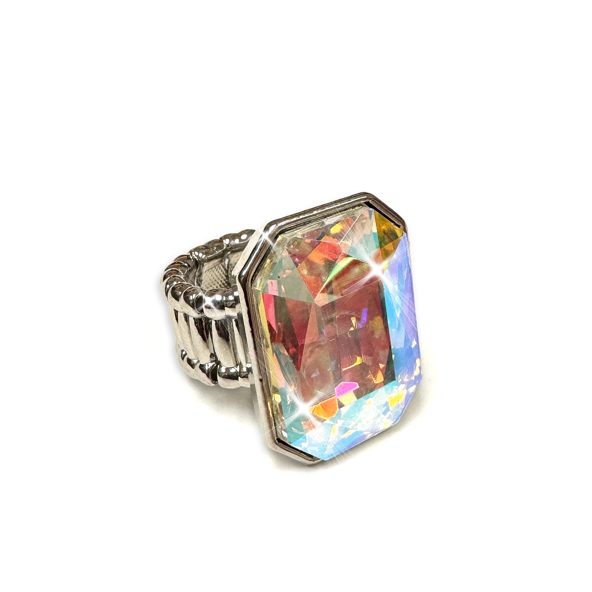 Stretch ring with a colorful aurora borealis gemstone on a white background