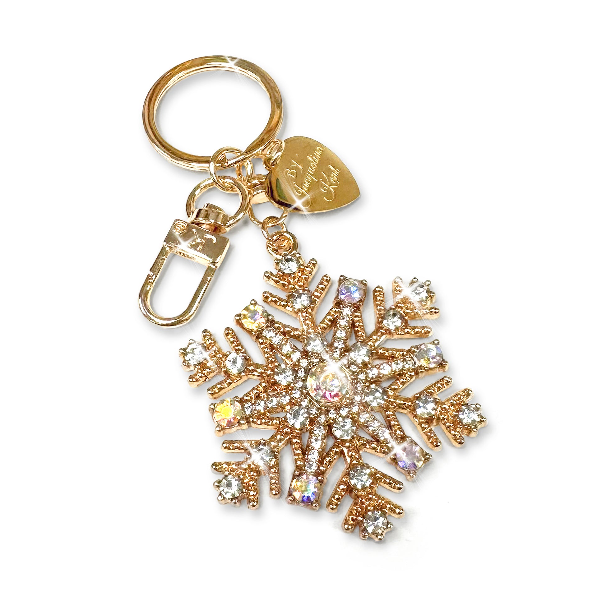 Gold snowflake keychain with iridescent AB crystal rhinestones on a white background