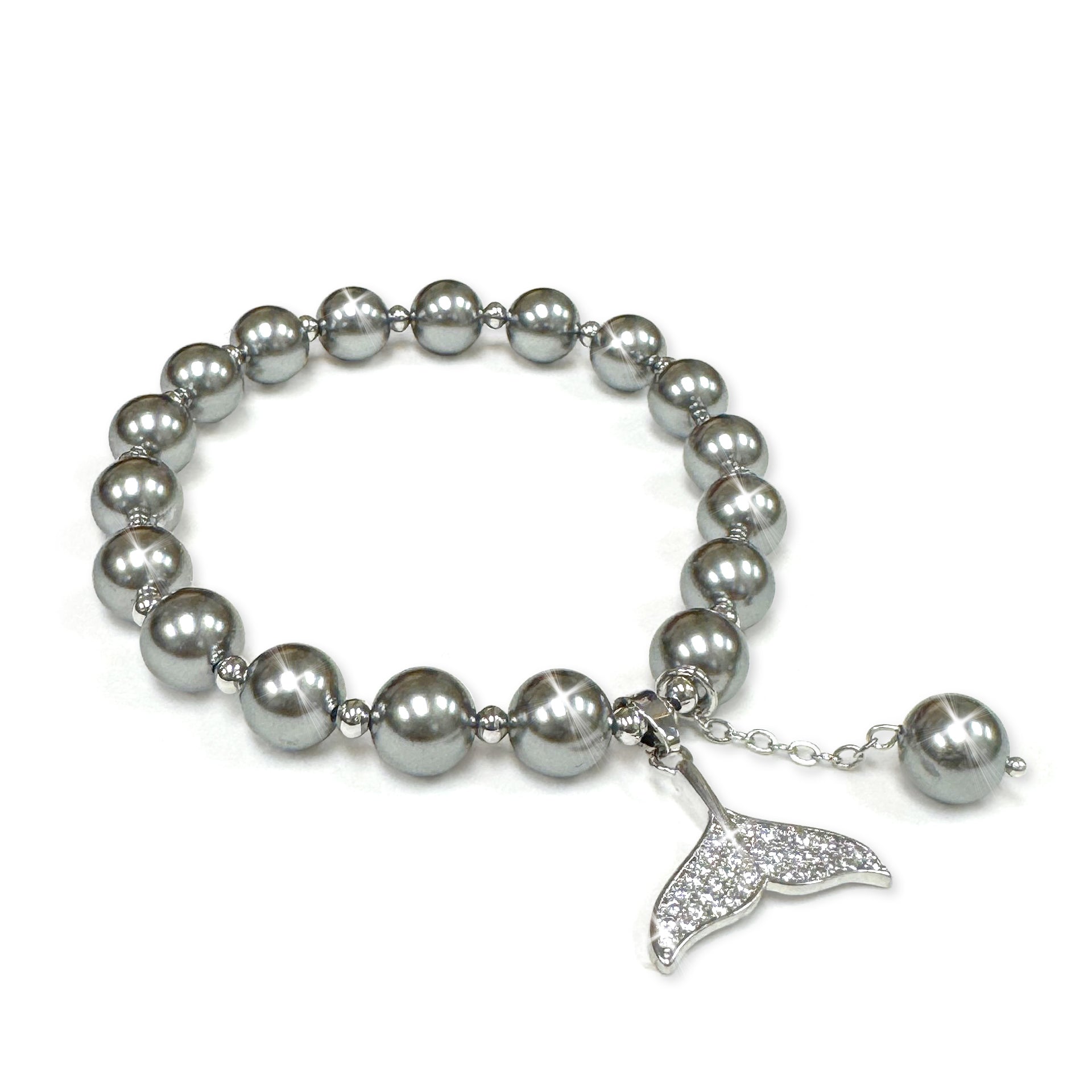Hematite faux pearl beaded bracelet with a mermaid tail encrusted in rhinestones charm on a white background