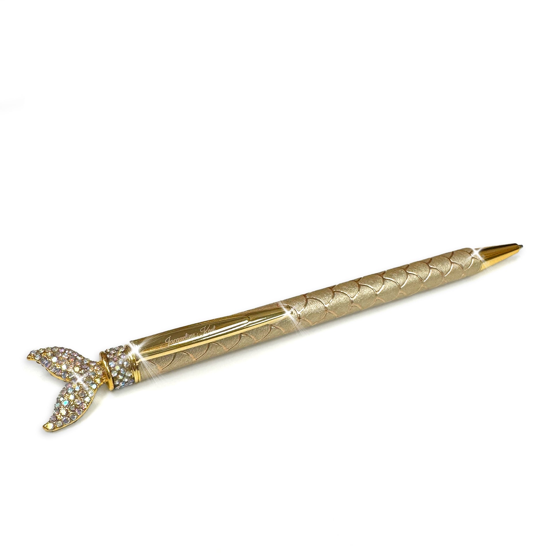 Decorative mermaid patterned pen with gold and crystal mermaid tail on a white background