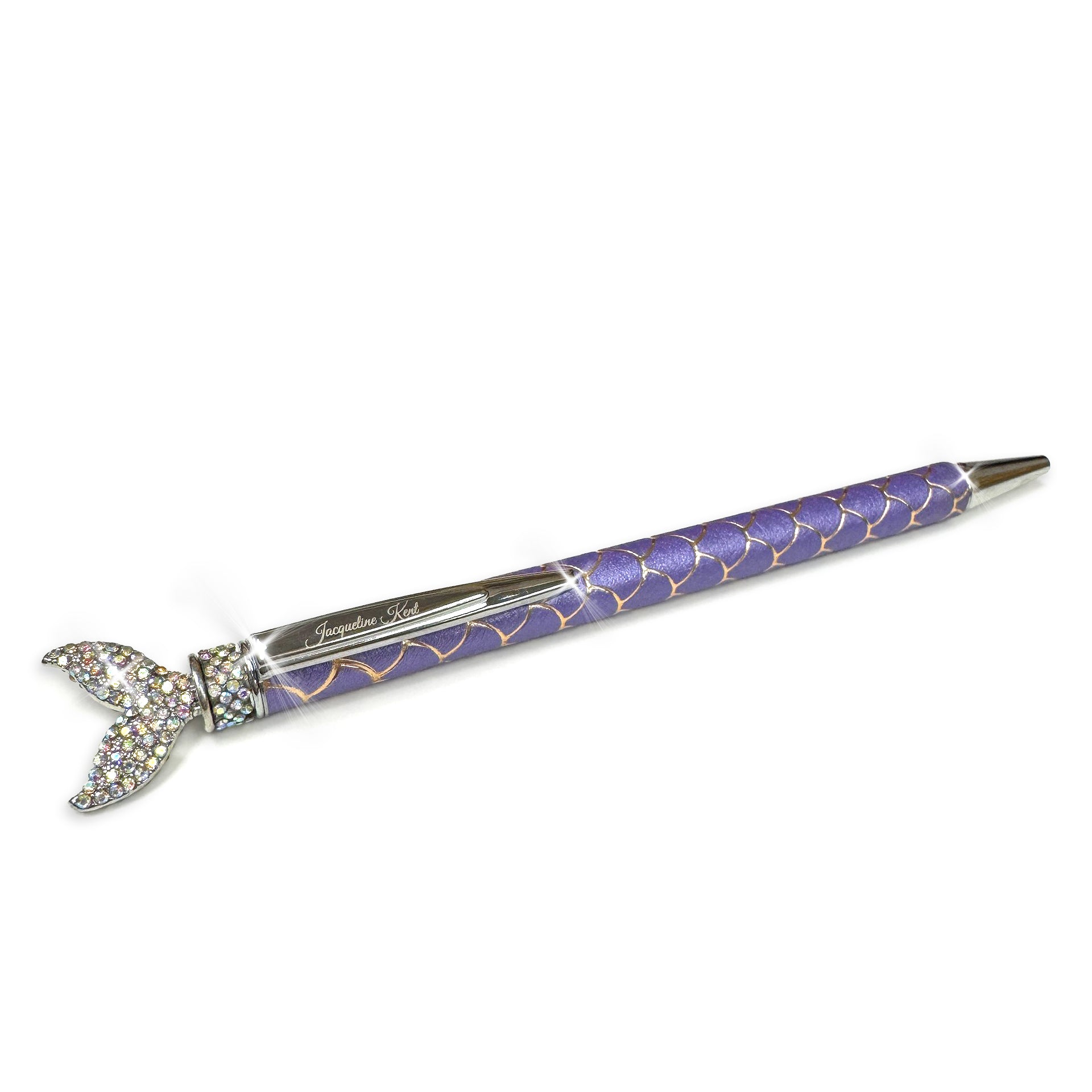 Decorative mermaid pen with purple and gold design with mermaid tail embellished top on a white background
