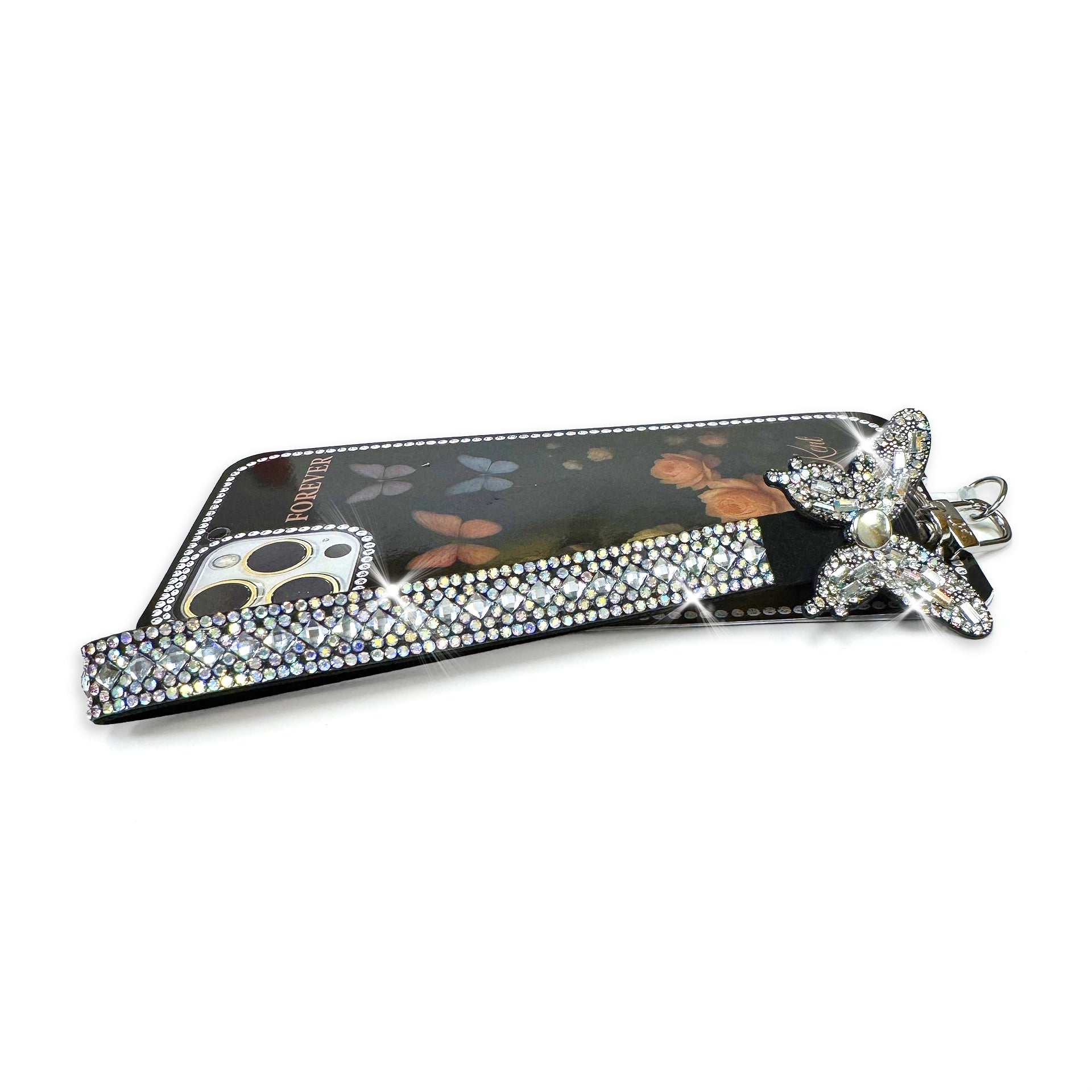 Phone wrist lanyard with a butterfly charm and rhinestone details on a white background